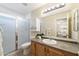 Clean bathroom with a shower/tub combo, vanity, and updated fixtures at 28629 N Zircon Ct, San Tan Valley, AZ 85143