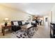 Spacious living room with leather couches and coffee table at 28629 N Zircon Ct, San Tan Valley, AZ 85143