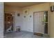 Inviting entryway with double doors and decorative accents at 9550 E Thunderbird Rd # 155, Scottsdale, AZ 85260