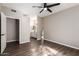 Bedroom with wood-look floors and en-suite bathroom access at 9550 E Thunderbird Rd # 155, Scottsdale, AZ 85260