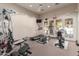 Well-equipped fitness center with various machines at 9550 E Thunderbird Rd # 155, Scottsdale, AZ 85260