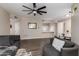 Bright living area with an open floor plan and a view into the kitchen at 9550 E Thunderbird Rd # 155, Scottsdale, AZ 85260