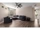 Open living room with comfortable seating and large windows at 9550 E Thunderbird Rd # 155, Scottsdale, AZ 85260