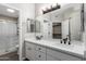 Modern bathroom with double vanity and walk-in shower at 9550 E Thunderbird Rd # 155, Scottsdale, AZ 85260