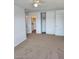 Bright bedroom with carpet, closet, and ceiling fan at 5906 W Townley Ave, Glendale, AZ 85302