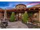 Charming courtyard with seating and a water feature at 9533 E Rising Sun Dr, Scottsdale, AZ 85262