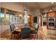 Kitchen breakfast nook with a round table and four chairs at 9533 E Rising Sun Dr, Scottsdale, AZ 85262