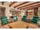 Spacious living room with exposed beams and comfortable seating at 9533 E Rising Sun Dr, Scottsdale, AZ 85262
