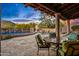 Relaxing pool area with patio furniture and mountain views at 9533 E Rising Sun Dr, Scottsdale, AZ 85262