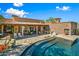 Stunning pool and spa area with a large patio for relaxation at 9533 E Rising Sun Dr, Scottsdale, AZ 85262
