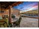 Entertaining pool area with patio furniture and mountain views at 9533 E Rising Sun Dr, Scottsdale, AZ 85262