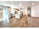 Open concept kitchen features an island and stainless steel appliances at 310 N Brower Rd, Maricopa, AZ 85139