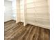 Walk-in pantry with ample shelving for storage at 310 N Brower Rd, Maricopa, AZ 85139