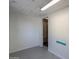 Unfinished basement room with door to adjacent space at 6253 S Avenida La Manana St, Gold Canyon, AZ 85118