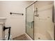 Bathroom with tiled shower and glass enclosure at 14950 W Mountain View Blvd # 1305, Surprise, AZ 85374