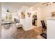 Open living area with tile floors, and access to kitchen and dining areas at 14950 W Mountain View Blvd # 1305, Surprise, AZ 85374
