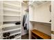 Spacious walk-in closet with shelving and hanging rods at 14950 W Mountain View Blvd # 1305, Surprise, AZ 85374