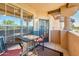 Private balcony with table and chairs, offering scenic views at 14950 W Mountain View Blvd # 1305, Surprise, AZ 85374