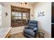Relaxing kitchen nook with recliner and window at 14950 W Mountain View Blvd # 1305, Surprise, AZ 85374