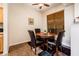 Small dining area with a round table and four chairs at 14950 W Mountain View Blvd # 1305, Surprise, AZ 85374