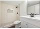 Modern bathroom with white vanity and shower/tub combo at 4630 N 68Th St # 215, Scottsdale, AZ 85251