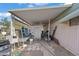 Small patio area with storage and various items at 5201 W Camelback Rd # 204, Phoenix, AZ 85031