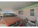 Covered carport next to the mobile home entrance at 5201 W Camelback Rd # 204, Phoenix, AZ 85031