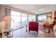 Living room with sliding doors leading to a patio and relaxing seating at 10408 W Sun City Blvd, Sun City, AZ 85351