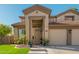Two-story house with a three-car garage and entryway at 959 W Myrtle Dr, Chandler, AZ 85248