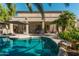 Large backyard with a pool, patio, and basketball hoop at 959 W Myrtle Dr, Chandler, AZ 85248