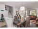 Elegant dining room with hardwood floors and a view of the living room at 959 W Myrtle Dr, Chandler, AZ 85248