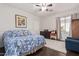 Serene bedroom with dark wood floors, window treatments and a comfortable bed at 959 W Myrtle Dr, Chandler, AZ 85248