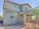 Two-story house with gray siding, a two-car garage, and a landscaped yard at 5414 S 10Th Ave, Phoenix, AZ 85041