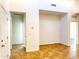Interior hallway with tile floors and access to rooms at 8940 W Olive Ave # 134, Peoria, AZ 85345