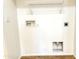 Laundry area with shelving and hookups for washer and dryer at 8940 W Olive Ave # 134, Peoria, AZ 85345