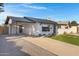 Newly renovated home with carport and artificial turf at 8614 E Windsor Ave, Scottsdale, AZ 85257