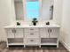 Elegant bathroom vanity with double sinks and white cabinets at 310 N Brower Rd, Maricopa, AZ 85139