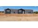 Single-story home with gray and dark gray exterior at 310 N Brower Rd, Maricopa, AZ 85139