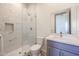 Modern bathroom with marble shower and gray vanity at 14914 E Zapata Dr, Fountain Hills, AZ 85268