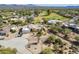 Single-story home with circular driveway and desert landscaping at 18533 E Paseo Verde Dr, Rio Verde, AZ 85263