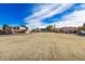 Community featuring a grassy lawn, ample parking, and residential buildings at 600 S Dobson Rd # 18, Mesa, AZ 85202