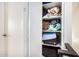 Linen closet with shelving for storing extra bedding and towels at 600 S Dobson Rd # 18, Mesa, AZ 85202