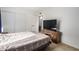 Spacious bedroom with a double bed and built-in media console at 600 S Dobson Rd # 18, Mesa, AZ 85202