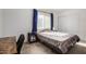 Cozy bedroom with a double bed, window coverings, and a workspace at 600 S Dobson Rd # 18, Mesa, AZ 85202