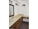 Bathroom with a vanity, sink, and large countertop at 4901 E Magic Stone Dr, Phoenix, AZ 85044