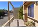 Backyard with covered patio and gravel landscaping at 4901 E Magic Stone Dr, Phoenix, AZ 85044