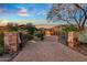 Elegant home with a large courtyard and gated entry at 10612 E Winter Sun Dr, Scottsdale, AZ 85262