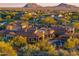 Luxury estate home with pool, mountain views, and expansive grounds at 10612 E Winter Sun Dr, Scottsdale, AZ 85262