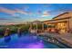 Stunning pool with patio, fire pits, and sunset views at 10612 E Winter Sun Dr, Scottsdale, AZ 85262
