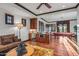 Spacious game room with pool table, wet bar, and comfortable lounge area at 10612 E Winter Sun Dr, Scottsdale, AZ 85262